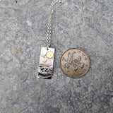 Rectangular Silver Coastal Pendant With Brass Sun