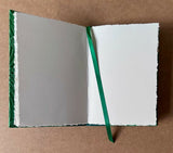 A5 handmade sketchbook containing deckle edge cotton rag paper