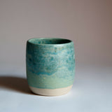 Ceramic beaker / budvase glazed in shades of turquoise and pale green