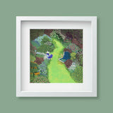 A framed art print depicting a woman enjoying her beautful garden and pond, presented in a white frame