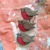 Robin Brooch in hand 1024 x 1024