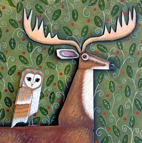 A fine art greeting card by painter Claire Brierley, featuring a large brown deer with large antlers and a small owl on a decorated green background with red berries.