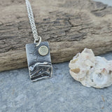 Rectangular Silver Coastal Pendant With Brass Sun