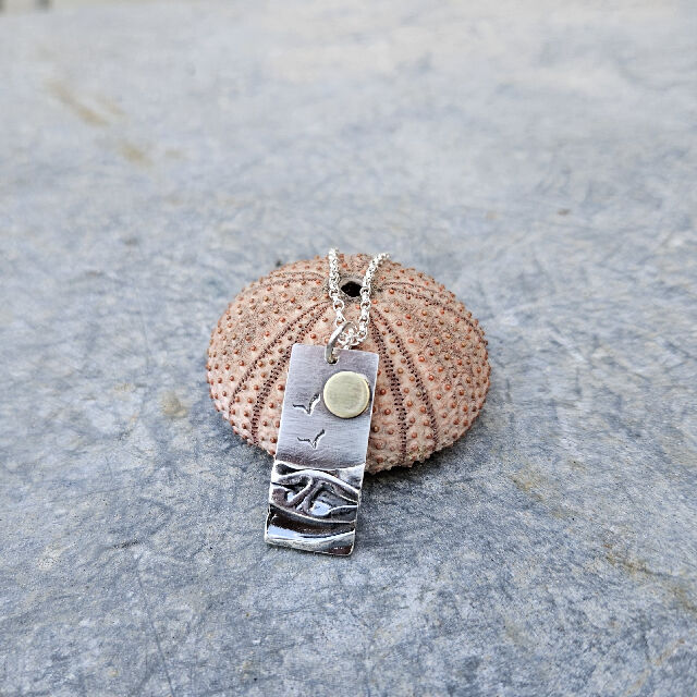 Rectangular Silver Coastal Pendant With Brass Sun
