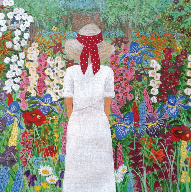 A fine art greeting card by painter and printmaker Marcella Cooper of a woman in a white dress and red headscarf standing in a colorful garden filled with flowers.
