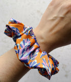 Orange-satin-silk-scrunchie-onwrist-06-2000px