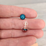 Claire Fernig Spinnaker Glass Mini Teal 925 Silver stud earrings held