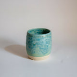 Ceramic beaker / budvase glazed in shades of turquoise and pale green