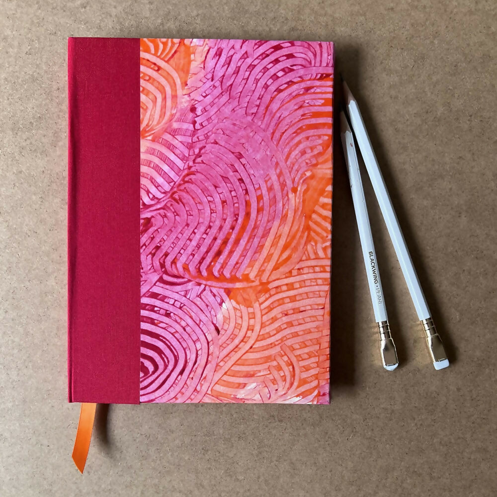 Handmade A5 hardback sketchbook containing deckle edge cotton rag paper