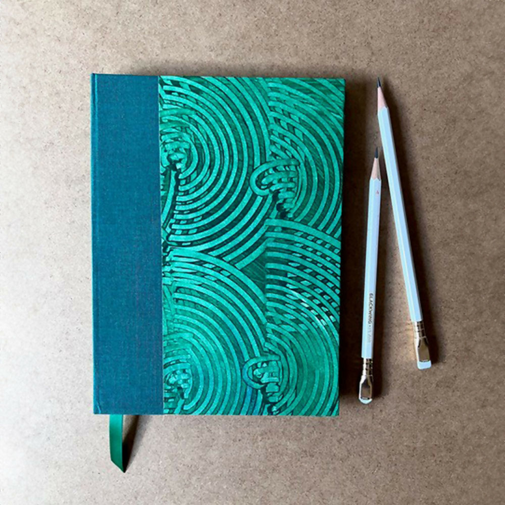 A5 handmade sketchbook containing deckle edge cotton rag paper