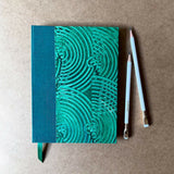 A5 handmade sketchbook containing deckle edge cotton rag paper