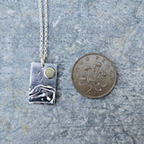 Rectangular Silver Coastal Pendant With Brass Sun