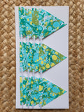 Green paper bunting