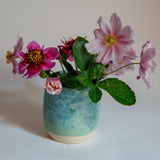 Ceramic beaker / budvase glazed in shades of turquoise and pale green