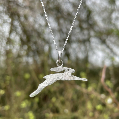 Silver running hare pendant necklace
