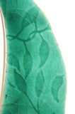 green sail close up